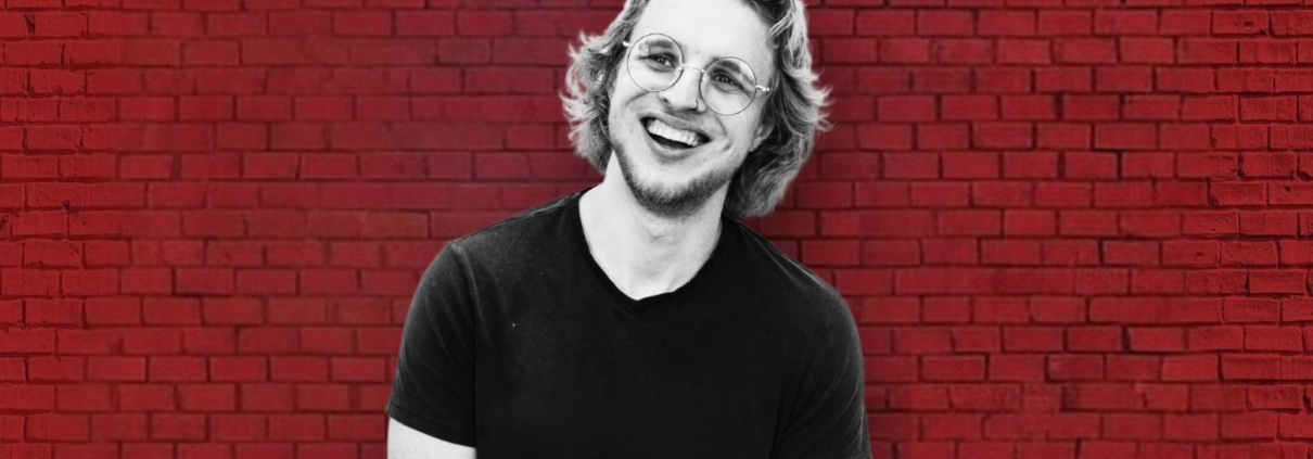 a photo of cole as jesus for godspell musical